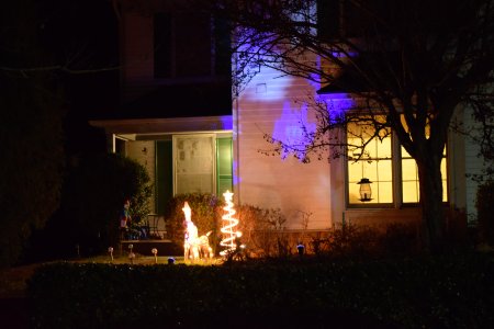 An end unit townhouse.  Lighted Christmas tree and reindeer, and some of those animated projection lights.  In general, I consider the projection lights to be fairly low effort displays.