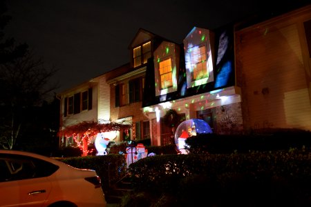 This one is at the entrance to my neighborhood, and was by far the most decorated in the whole bunch.  Lots of inflatables, including a character from Frozen and a snow globe, and lots of projection lights.