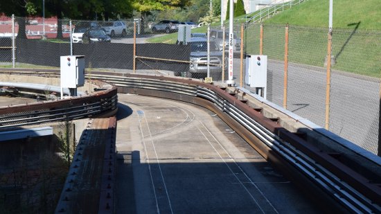 The roadway on the PRT system, at the Health Sciences Center station.  What looks like a guardrail is actually the "third rail".