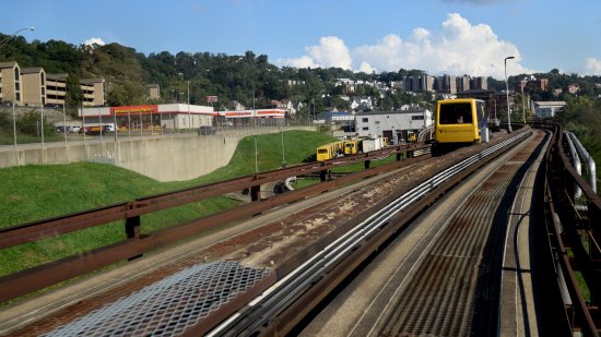 Another vehicle passes us going the other direction.  The maintenance facility is visible in the distance.