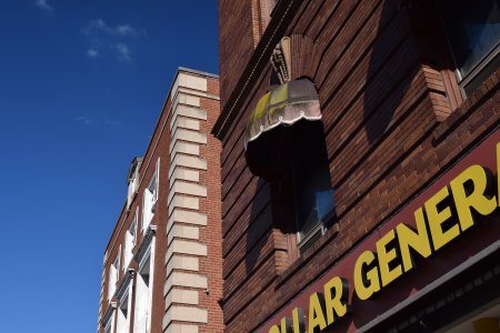 This awning on a window over the Dollar General store demonstrated the vintage quality of downtown.  It was clear, with the green growth on it, that this awning had been there for many years.