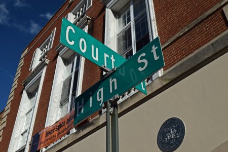 Street sign for Court and High Streets.