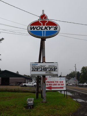 "Wolky's" on an Amoco sign