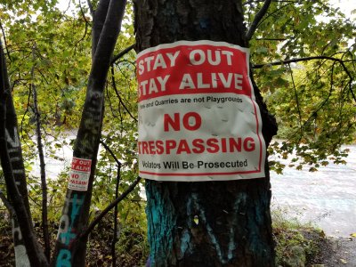 "Stay out, stay alive.  Mines and quarries are not playgrounds.  No trespassing.  Violators will be prosecuted."