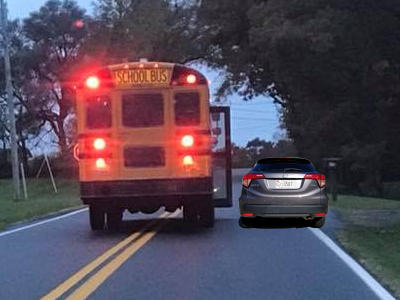 The school bus photo, with my Honda HR-V to scale, showing that there is enough room for a vehicle to pass the school bus on the right