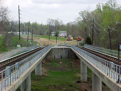 This was my first time taking the Metro to Maryland, as I rode out to Addison Road station, completing the Blue Line in its entirety, and marking the first time that I had ridden an entire line from end to end (though not in one sitting).  This was during the early stages of construction of the extension to Largo.  Note the bump posts marking the original end of the tracks just past the bridge over Cabin Branch Road.