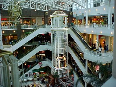 In 2014, the eighties called Pentagon City Mall, and they asked for their decor back.  Pentagon City now looks totally different, sporting a dark color scheme.  The new decor looks great, but I admit that I kinda miss the old styling, because that's the Pentagon City that I grew up with.