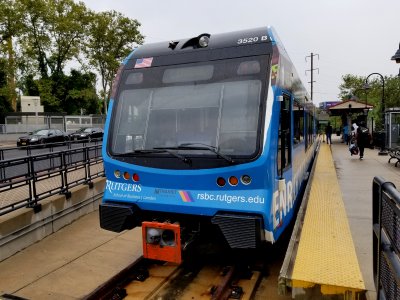 River Line train at Trenton, wearing a Rutgers ad wrap