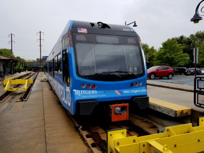 River Line train at Trenton, wearing a Rutgers ad wrap