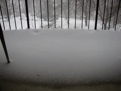 My apartment balcony, with an accumulation of snow on it.  I shoveled that clean myself.