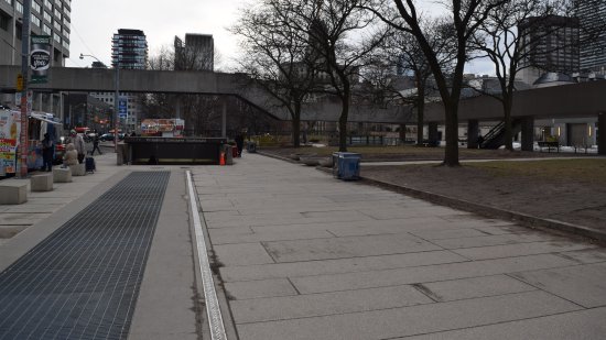 The sidewalk next to Nathan Phillips Square, which Muffy rode along in search of a new home in "Our Story Part 1".