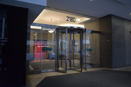 The entrance to 2180 Yonge Street, used as the main office in "Our Story Part 2", where Jodie ran completely around the revolving door, realized what she did, and then ran back in.