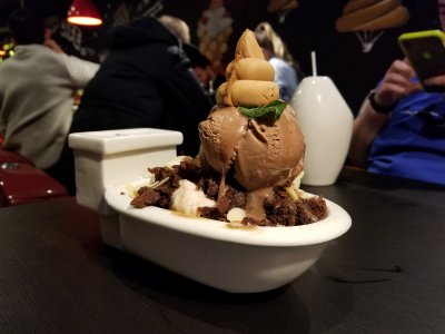 Having dessert at Poop Café, a poop-themed restaurant on Bloor Street that bills itself as "Toronto's First Toilet Themed Dessert Bar".