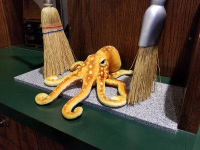 Elyse messed with Woomy a little at the railroad museum in Altoona.  The two brooms here are part of an interactive exhibit, and they swept back and forth.  Woomy got quite a shaking from it, and shouted, "I don't like that!"