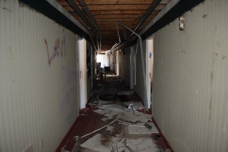 First floor corridor.  Note that the drop ceiling is completely gone.  Wires were hanging from the ceiling, as well as bits of ceiling grid.