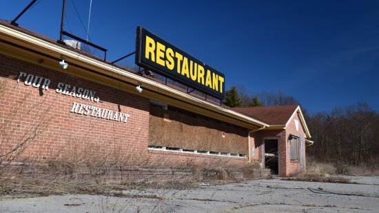 The Four Seasons Restaurant, located next door.  According to public records, this facility was shut down in 2009 for health violations.  I don't know if it reopened after that, but it is very much abandoned now.