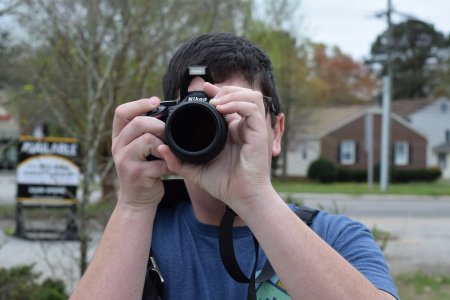 Evan lines up a photo of the Long Lines tower with my zoom lens.