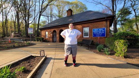 Elyse is all smiles after having left a token of her appreciation there, and then sending it on its journey.