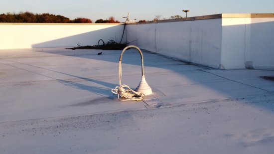 This thing on the roof, near the air handling unit.  Your guess is as good as mine as to what this is.