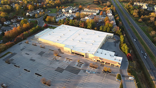 The Walmart building and other shops, viewed from the maximum altitude of 400 feet.