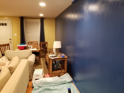 The first coat on the rest of the accent wall is complete.