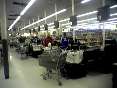 The new front end replaced the old color scheme with blue registers and red numbers with black, and introduced self checkout machines for the first time.  The self checkouts were IBM models.