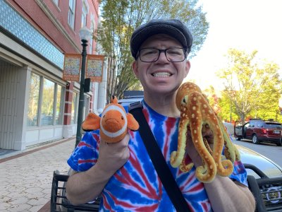 Posing for a photo with David and Woomy in downtown New Bern.