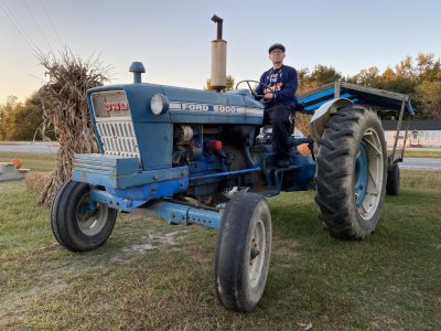 Sitting on an old Ford tractor at a peanut place in Capron, Virginia along US 58 on the way to Hampton Roads.