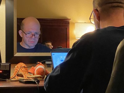 Evan got a photo of me in the room at the hotel in Newport News, offloading files from the day's photography.  I suppose that it's a reminder that for all of the time I spend in the field, I spend even more time working at my desk preparing stuff for publication.