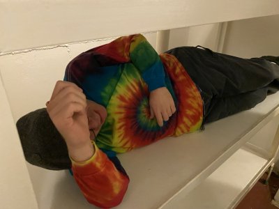 Trying to find a comfortable position on the bunk in the Wisconsin's brig.  It's pretty hard to find a comfortable position on a bare steel bunk, but I suppose that the position in the bottom shot was the closest that I could get.