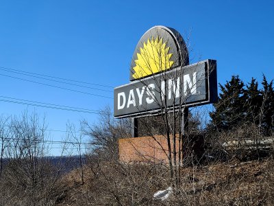 The Days Inn sign facing the road is unchanged.