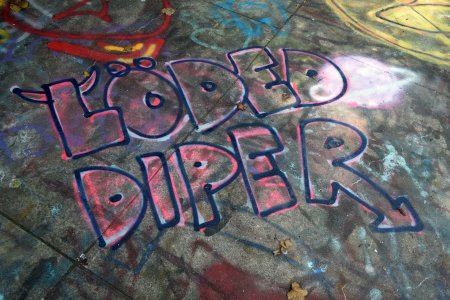 "Löded Diper" graffiti, referring to a fictional band from the Diary of a Wimpy Kid book series.