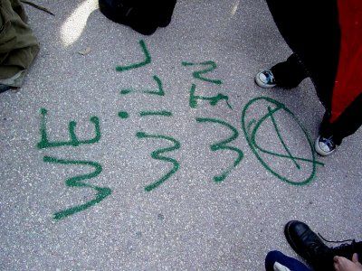 Graffiti on the sidewalk in front of the Capitol