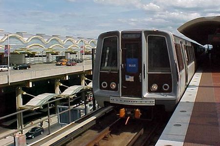 A Blue Line train to Addison Road arrives at National Airport station.  Note the 1000-Series (Rohr) car in the lead position.