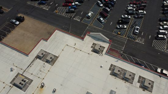 Flying over the roof of the store, I was surprised that the edging around the top of the store was still red.