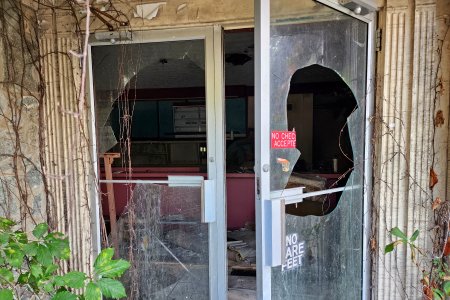 The building is also now completely open, as one of the front doors had no glass anymore, and the inner doors were unsecured and shattered.