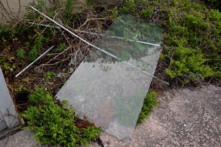 Interestingly, the missing glass from the front door was still fully intact, though now laying to the side of the entrance, a few feet away from where it hung for 70-some years.