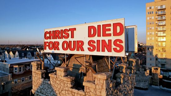 The big "CHRIST DIED FOR OUR SINS" sign on the top of Chelsea Baptist Church.