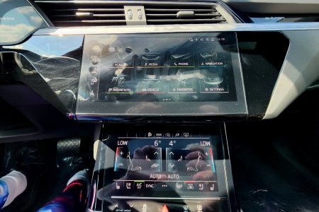 The touchscreens in the center.  The bottom one was more about mechanical functions of the car, while the top one was more about entertainment and communications functions.