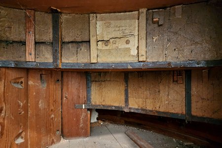 In a compartment over a staircase is the signature of Thomas Blackburn, the architect who designed the building.