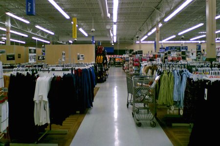 Aisle down the middle of the clothing area.  Note that the red stripes on the floor are now gone.