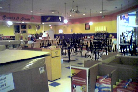 The in-store restaurant was called "Gingy's Pop Shop".  I had only ever seen this concept here, and this was during a time when Walmart was phasing out the in-house snack bar operations in favor of outsourced businesses like McDonald's.