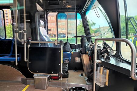 While we were at Braddock Road, I grabbed a photo of the operator's compartment of bus 97.  Except for the shield, that's classic Orion V right there.  Note that the farebox has already been removed from the bus.