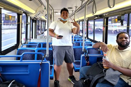 Sergio poses for a photo while we were on the Beltway, while Brandon looks on.