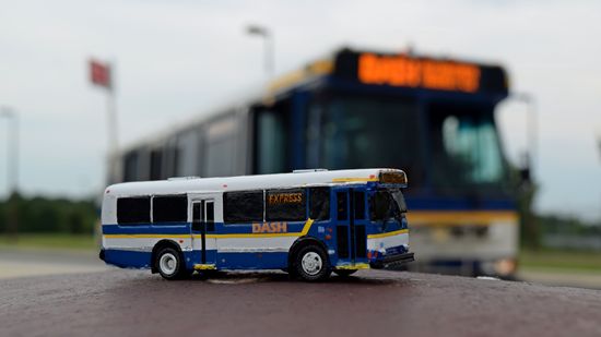 I got my own photos with the model, with the model in the foreground, while the real bus is standing in the background.