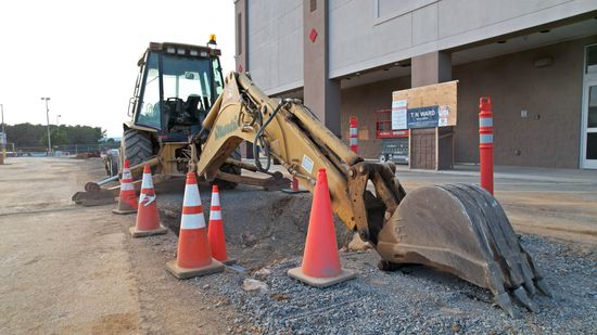 Heavy equipment in front of the former Lowe's