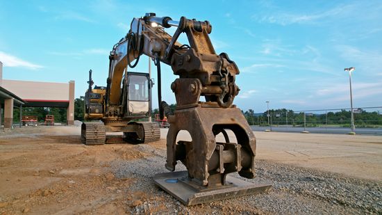 Heavy equipment in front of the former Lowe's