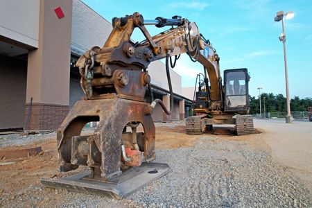 Heavy equipment in front of the former Lowe's