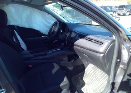 The interior of my former car, with that new set of drapes along the left side windows (fancy!).