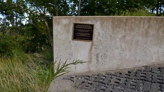 This dedication plaque from the dam's 2013 rehabilitation bothered me a lot.  It is skewed, and there is no reconciling that skew, i.e. it does not correspond with anything considered "level" anywhere.